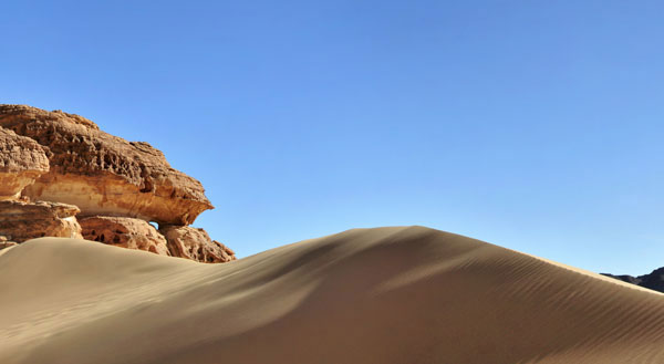 Sand dune and rocky desert